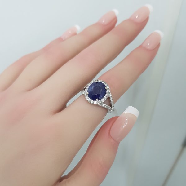 White Gold Diamond Ring with Sapphire - R1200
